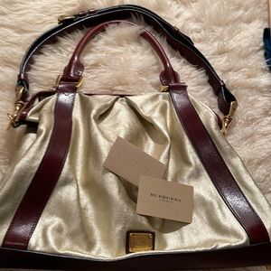 Burberry Gold leather carry-all.